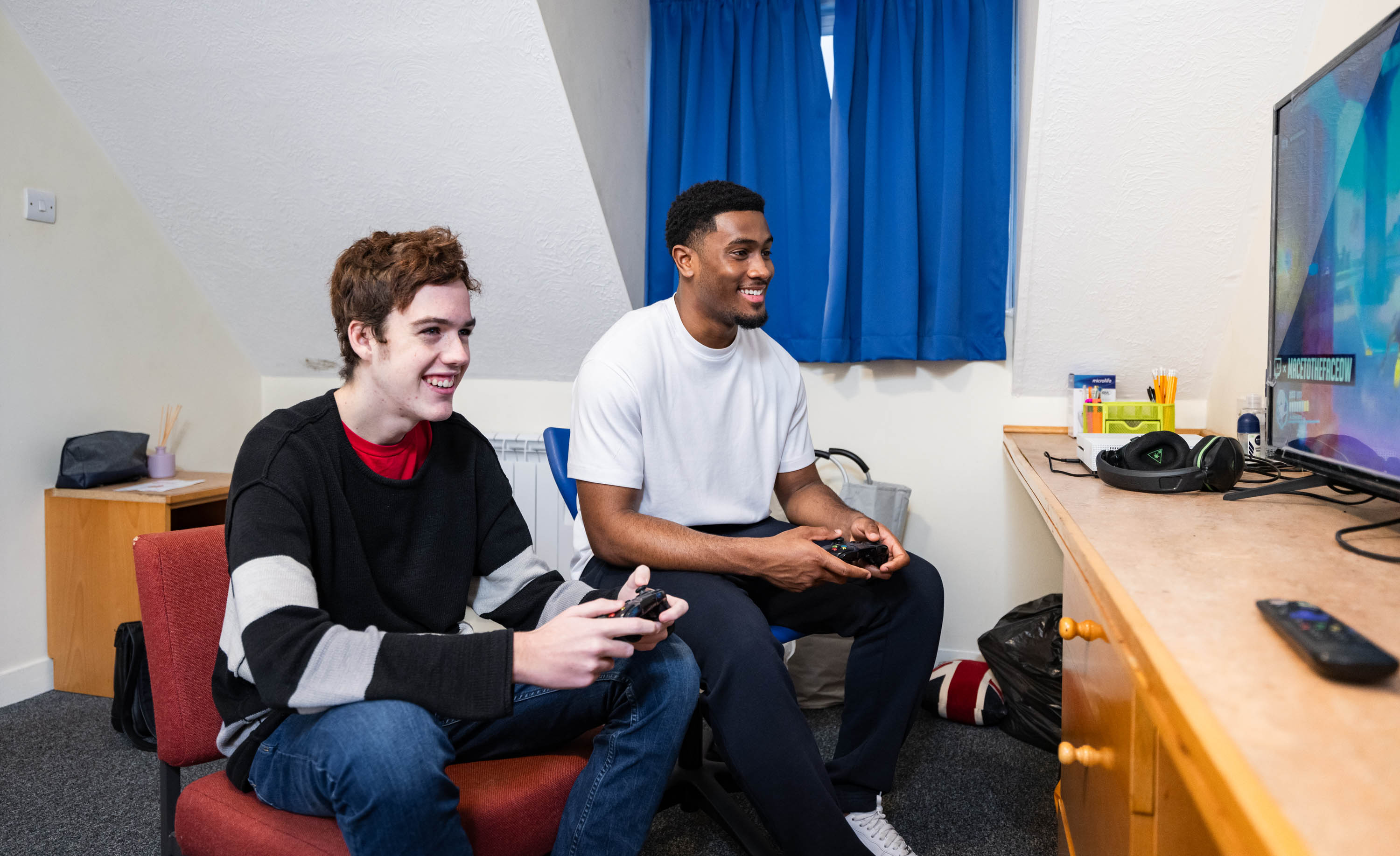 Students playing on a games console. 