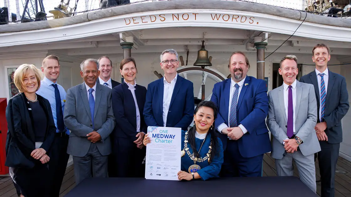 The One Medway Charter signing group with the charter