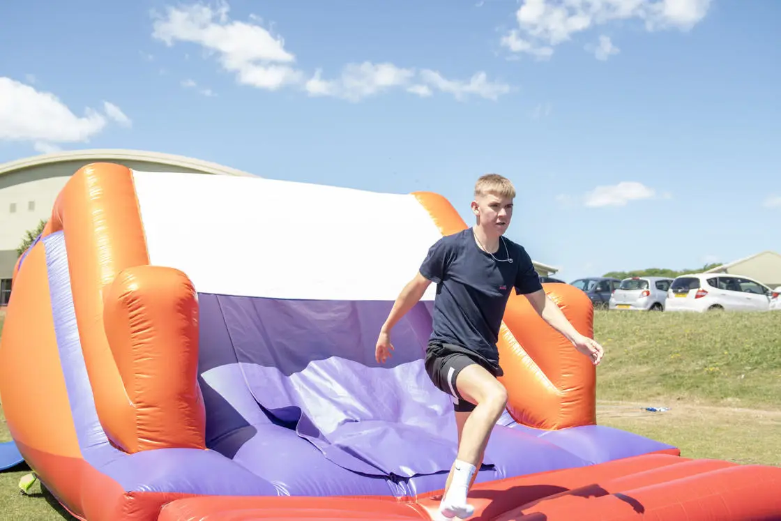 An inflatable obstacle course was part of the activities 