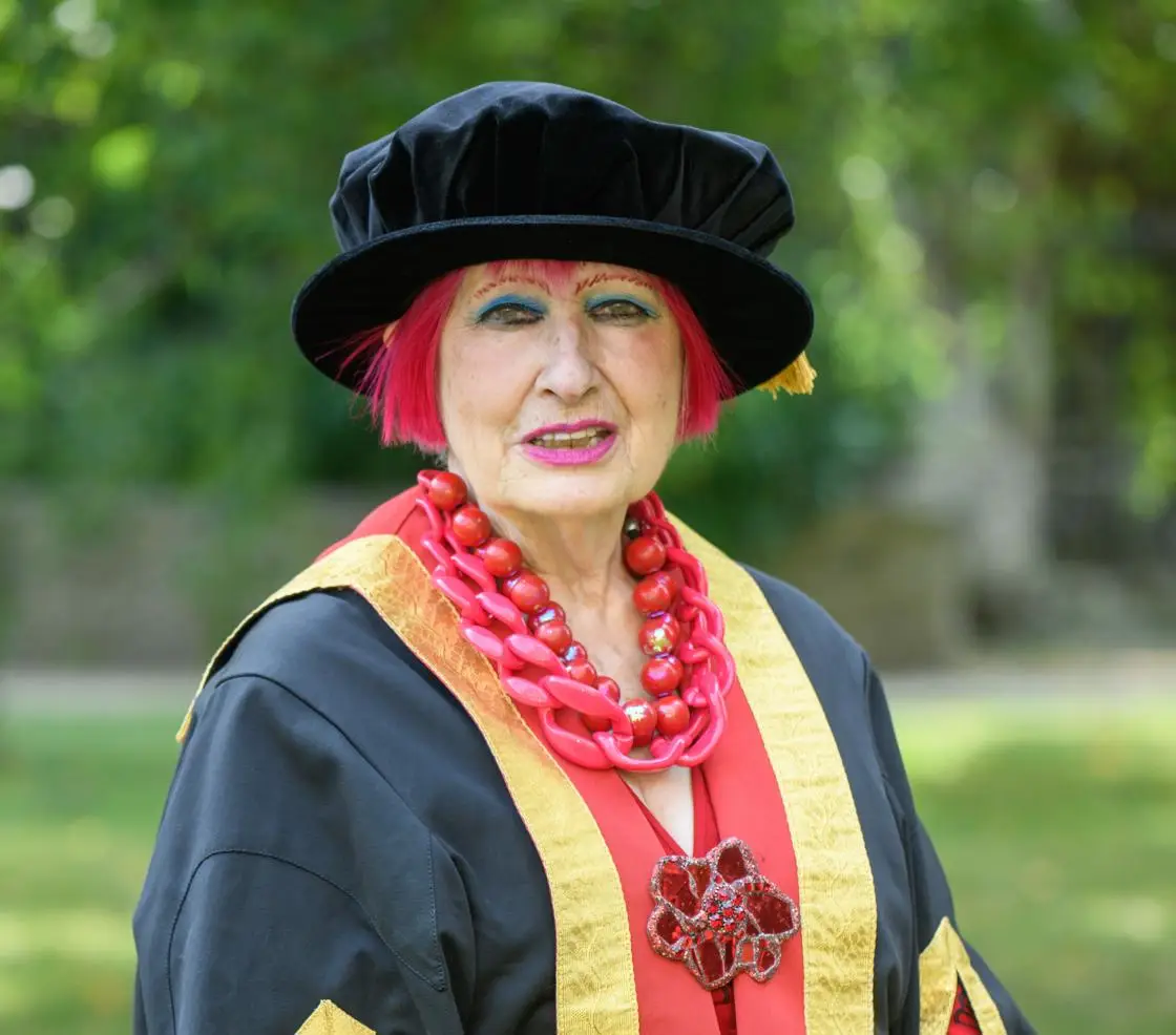 Dame Zandra Rhode in graduation gown and bonnett